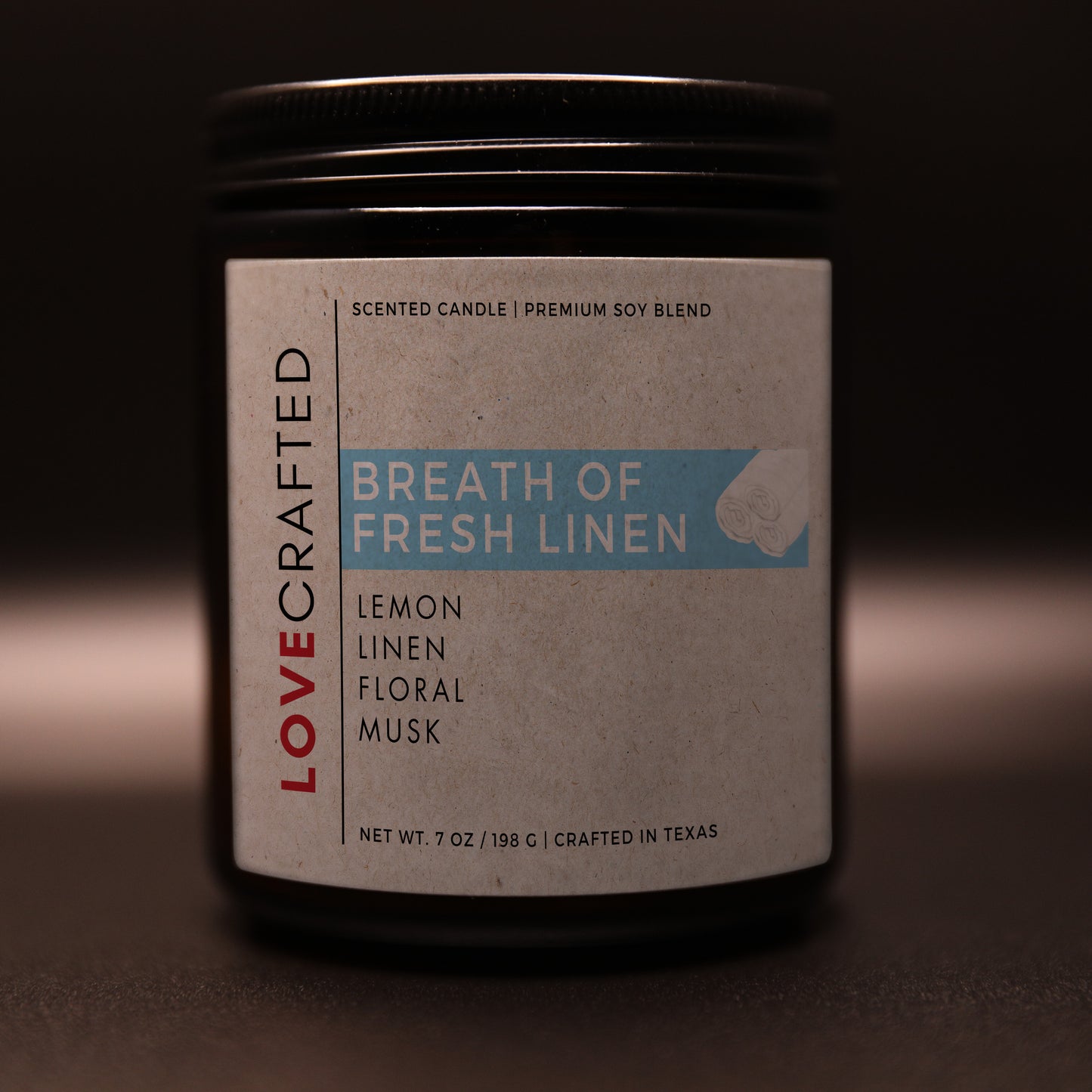 Breath of Fresh Linen 7oz soy blend candle in amber jar
